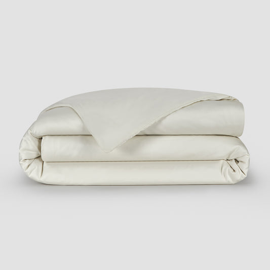 Capa de edredão Eggshell bambu by Momo Cotton – tecido de cetim 300 fios, suave, respirável e sustentável.